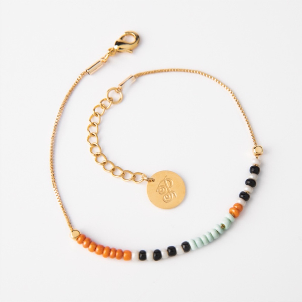 🆕 Gold Beaded Bracelet with Black and Orange Accents